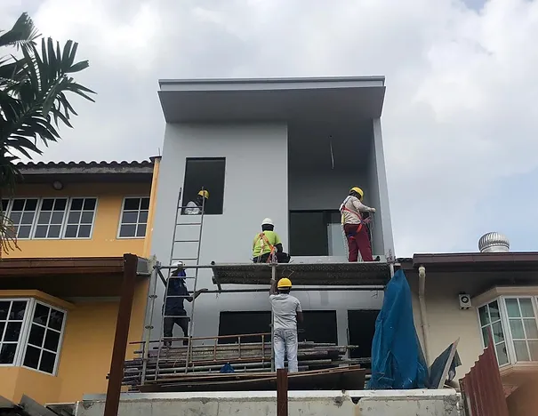 Workers conducting home renovation, showing KBuild Contracts' focus on remodeling and structural enhancements.